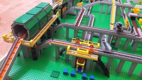 Detail of manual triage carried out with lego-type pieces for solid urban waste management.